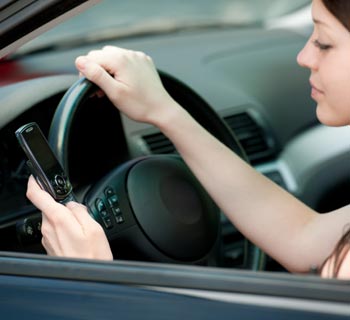 Teenage Female Texting While Driving