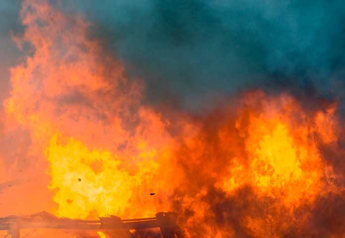 Fire Consumes Building