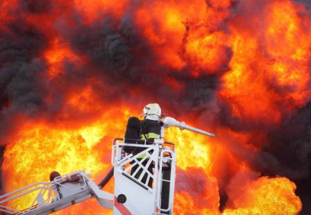 Fighting Fire on Roof of Building