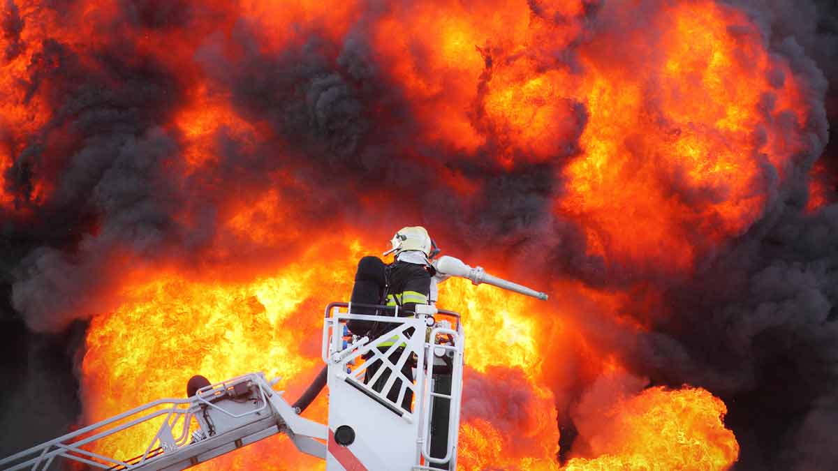 Fighting Fire on Roof of Building