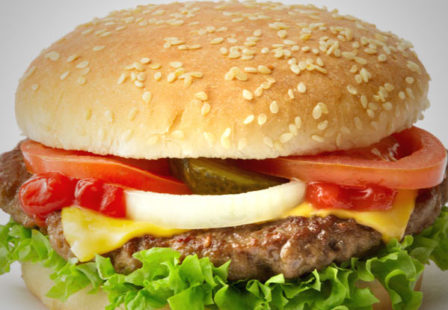 Cheeseburger with lettuce, tomato, onion, pickles ketchup, sesame seed bun