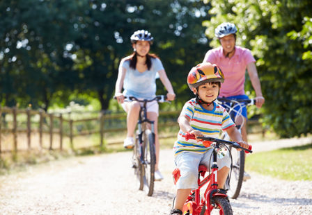 family riding their bicycles