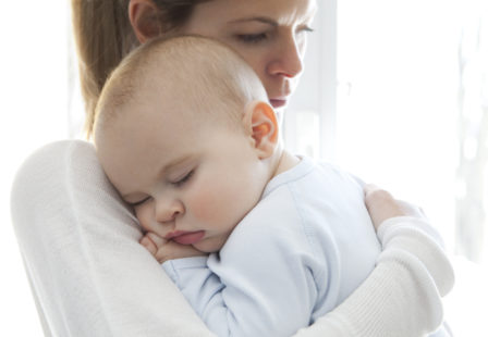 concerned mother with sick child