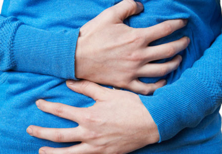 Salmonella lawyer woman clutching abdomen