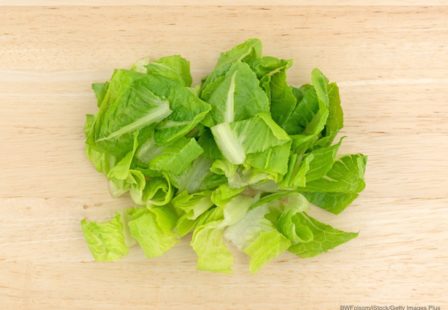 Listeria Lawyer- cut romaine lettuce on wood board