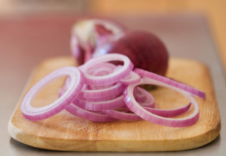 Salmonella Lawyer - red onions and sliced red onions on a cutting board