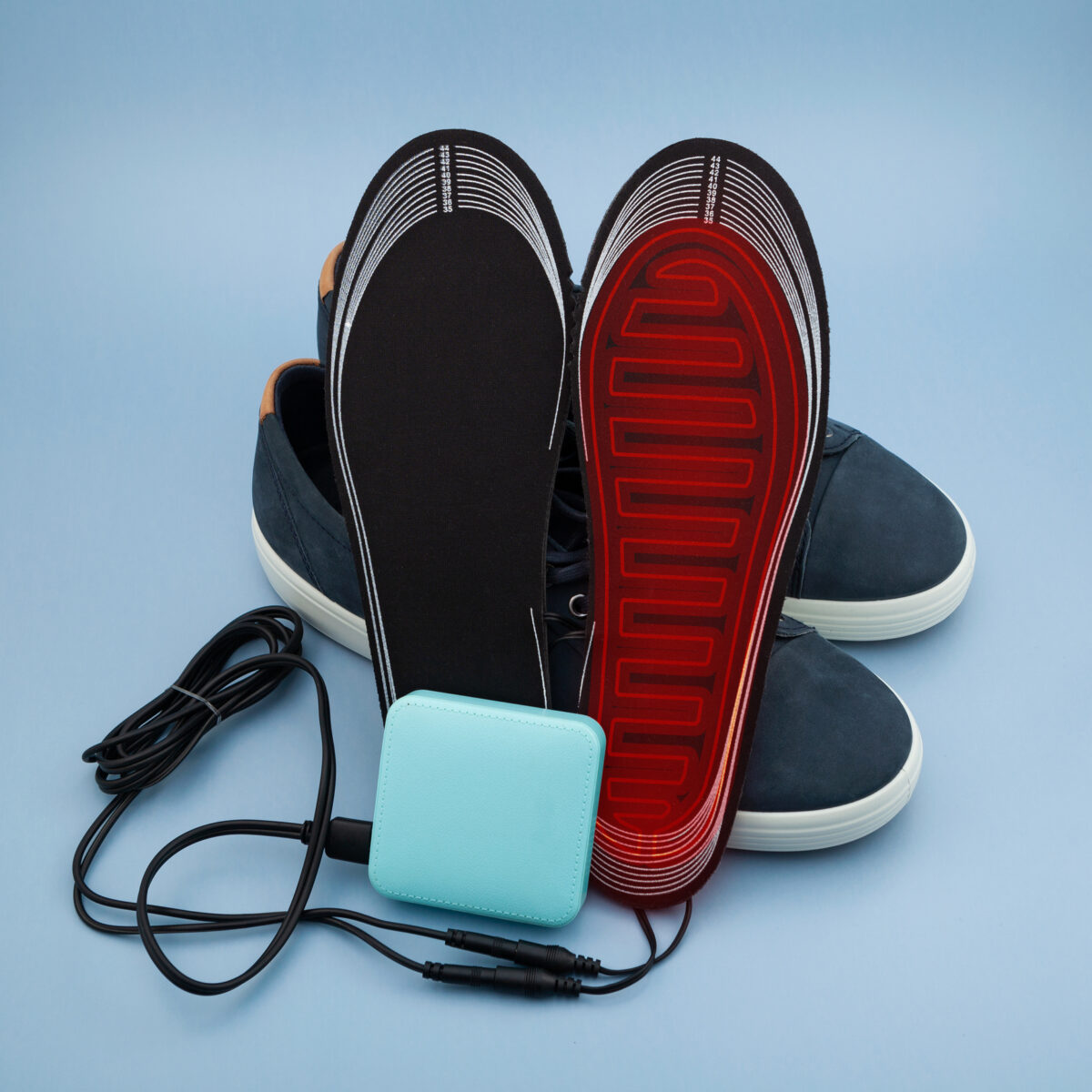 Battery electric heated insoles